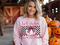 in october we wear pink pumpkin with check background